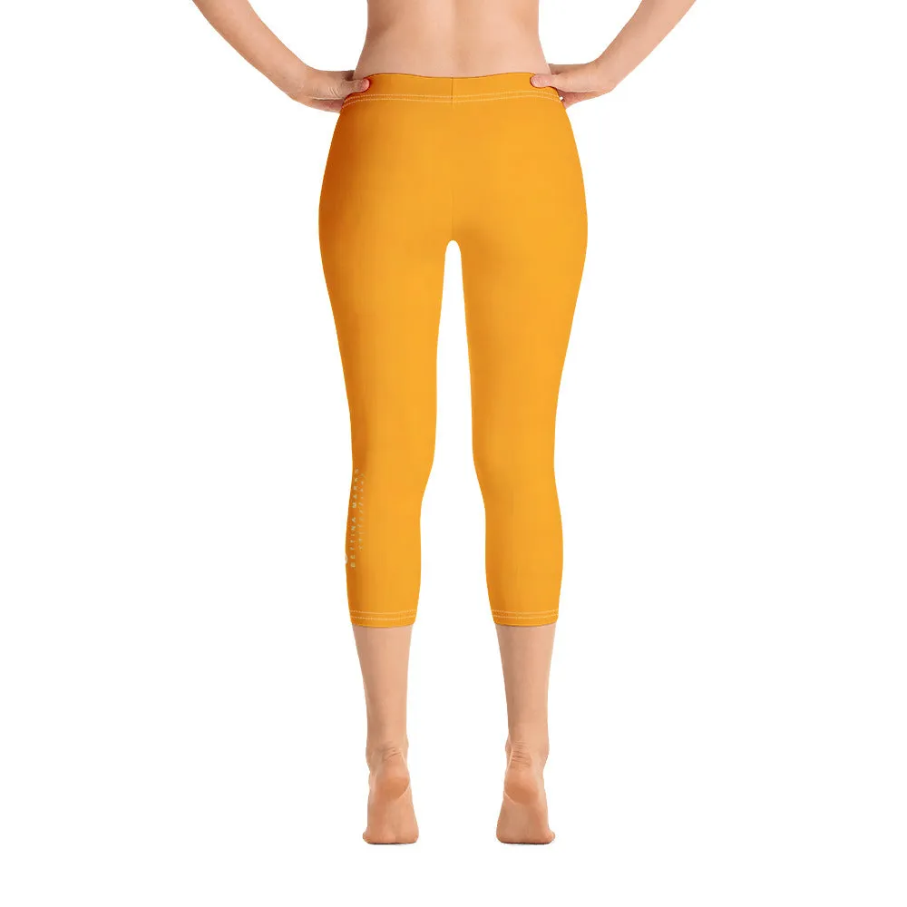 Sacral Orange Capri Leggings